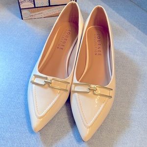 White kitten heels with gold buckle